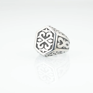 Vintage gothic signet ring in silver finish with tribal totem on hexagonal surface