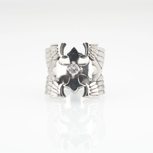 Gothic punk titanium steel ring featuring a cross and wings with a central crystal stone