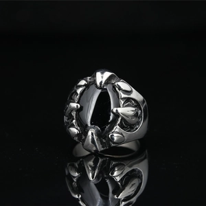Men's punk rock vintage ring with black onyx stone in silver dragon claw setting