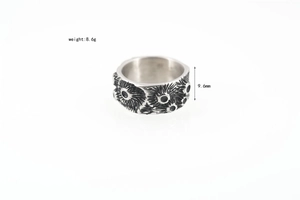 Silver punk ring with radial relief texture and industrial design, 9.6mm wide band