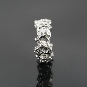 Vintage irregular titanium steel ring with textured silver finish for a bold hip-hop look