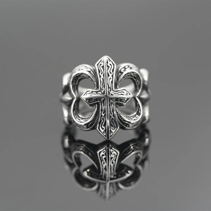 Vintage oxidized silver cross ring with floral patterns and a polished gothic finish