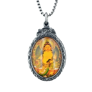 Collier avec pendentif Bouddha Jambhala jaune en acier argenté de style ethnique