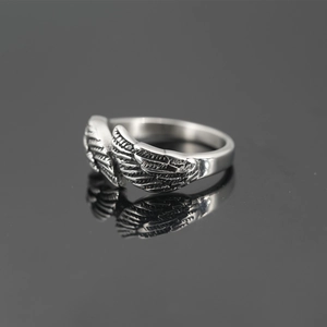 Retro irregular wings ring for men with vintage feather texture and mirror reflection