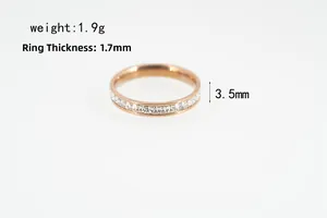 Detail view of rose gold titanium ring with square zircons and 3.5mm width dimensions
