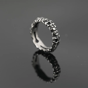 Vintage punk skull ring in distressed stainless steel with 3D carved skeleton details