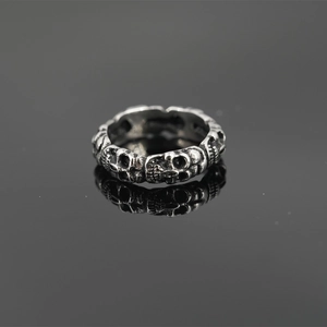 Retro punk style skull ring crafted in vintage stainless steel with oxidized finish
