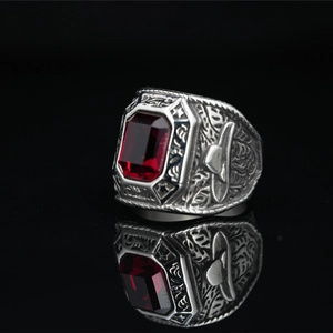 Men's punk titanium steel ring with emerald-cut red gemstone and ornate vintage carvings