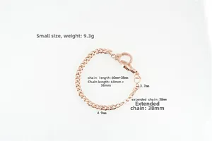 Detailed view of rose gold handcuff bracelet with flat tank chain links and dimensions