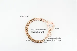 Detail of rose gold handcuff pendant on cuban link bracelet with lobster clasp