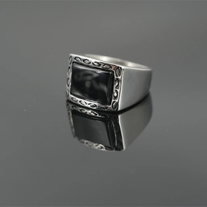 Vintage silver steel ring for men featuring rectangle black stone and embossed details