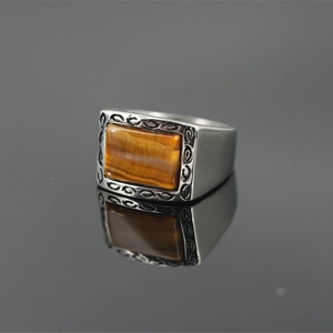 Retro men's signet ring with rectangular tiger eye stone and vintage steel patterns