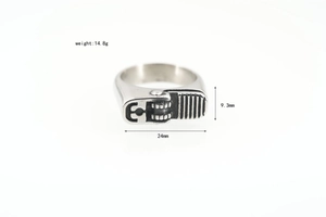 Detail view of vintage silver lighter-style ring with punk gear texture and dimensions