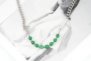 Detail of green beads and silver stainless steel chain with T-bar toggle clasp necklace