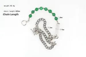Macro shot of 8mm green bead necklace with chunky stainless steel chain and OT clasp
