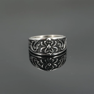 Gothic style silver plated titanium steel ring with intricate floral carvings and cross