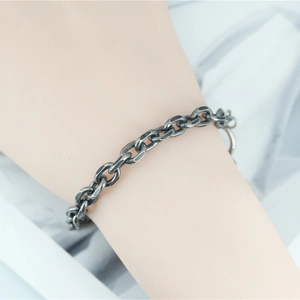 Bracciale di coppia in acciaio al titanio con maglie ovali in argento in stile retrò vintage