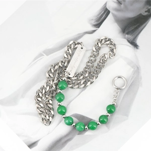 Silver chunky chain necklace with green beads and engraved 'pretty and playful' tag