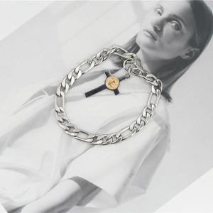 Retro stainless steel Figaro chain bracelet featuring a St. Benedict medal cross pendant