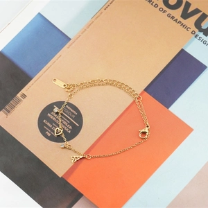 Bracelet doré en acier inoxydable pour femme avec breloques étoile, cœur, tour Eiffel et strass