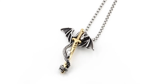 Detailed close-up of a dragon coiled around a golden sword pendant on a square link chain