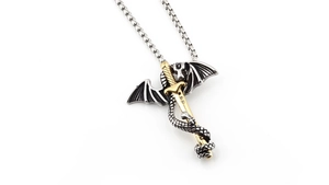 Detailed view of a vintage gothic 3D dragon wrapped around a golden sword pendant