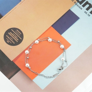 Élégant bracelet double couche en acier inoxydable avec perles blanches et billes