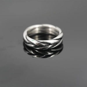 Vintage silver twisted rope titanium steel ring with an oxidized finish for a retro aesthetic