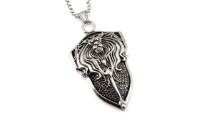 Close-up of retro silver shield pendant necklace with detailed lion head relief