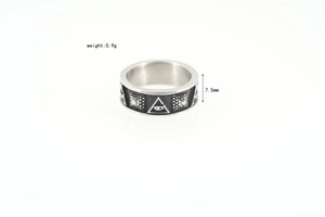 Detailed macro view of All-Seeing Eye engraving on vintage titanium steel ring