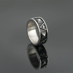 Vintage oxidized titanium steel ring featuring an engraved Egyptian eye of providence symbol