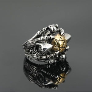 Retro punk Gothic claw ring with golden star sphere and skull bone textures