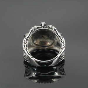 Retro punk style All-Seeing Eye ring with silver skeleton details and hollow patterns
