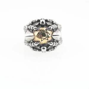 Vintage punk Eye of God ring with golden hexagram star and silver eagle claw design