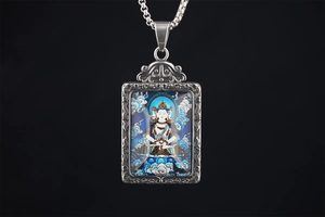 Detailed Buddhist Thangka pendant showing intricate colorful patron buddha deity in titanium steel