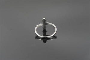 Detailed view of the vintage silver cross ring with a matte finish and open band design