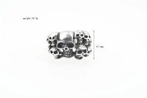 Macro shot of vintage silver skull ring showing detailed 10.7g weight and 17.1mm height dimensions