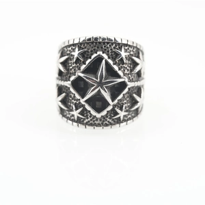 Retro punk titanium steel wide ring featuring a large five-pointed star relief design
