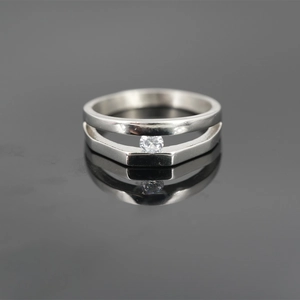 Minimalist double-layered silver ring with a sparkling center stone for men and women