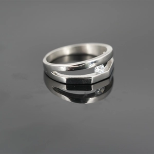 Double-layered minimalist silver ring with a sparkling center zircon stone
