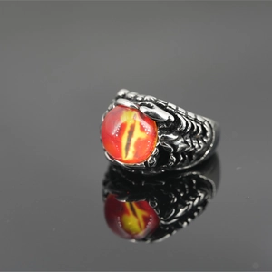 Gothic dragon eye ring with dragon claw texture in silver titanium steel and red gemstone