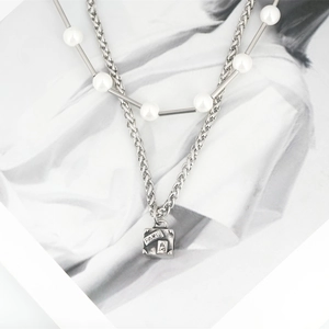 Double-layered men's titanium steel necklace with white pearls and PARIS cube pendant