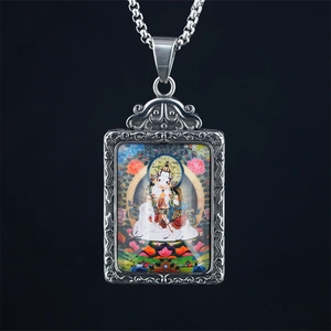Religious Thangka pendant necklace in silver stainless steel featuring a Buddhist deity