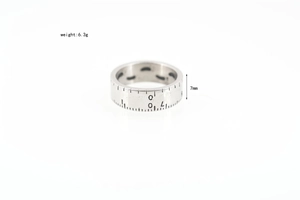 Detailed macro view showing the 7mm width and scale marks of this titanium steel ring