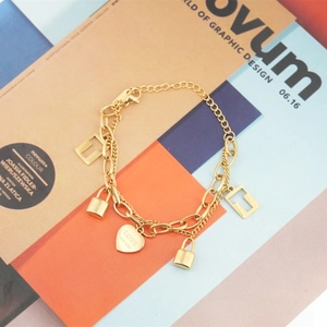 Gold double-layer stainless steel bracelet with heart charms and lock pendants