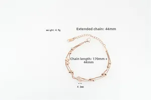 Detail view of rose gold star bracelet featuring lobster clasp and 44mm extension chain