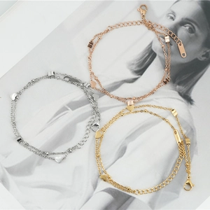 Bracelet à Rangs Superposés en Acier Inoxydable Pendentif Cœur pour Femme Ajustable Minimaliste Chic Or Rose Argent Chevillère