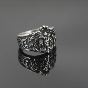 Retro punk fleur-de-lis stainless steel ring with gothic oxidized finish and reflection