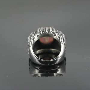 Retro silver ring with brown cat eye stone and vintage engraved feather details