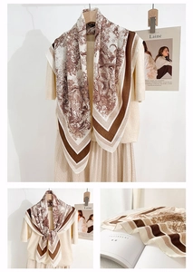 Detail of Toile de Jouy lion print scarf with stripe edges and silky texture
